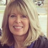 Headshot of middle aged blonde woman and ID Life board member Carol C.