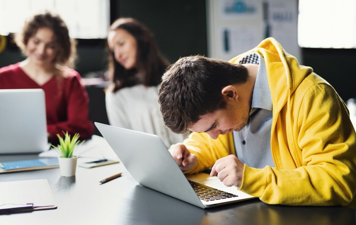 Down Syndrome Man With Laptop Attending Education 