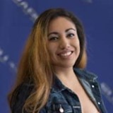 Headshot of young hispanic girl and ID Life staff member Sandy C.