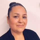 Headshot of middle aged Hispanic woman and ID Life staff member Lori G.